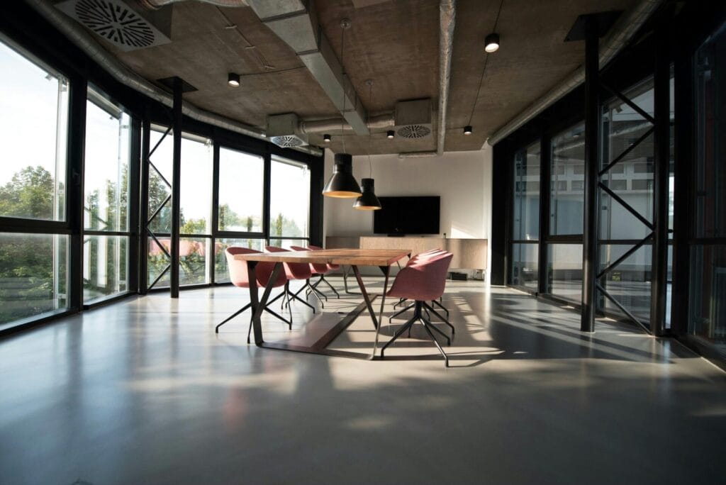 IFZA Free zone boardroom facilities, a room with a table and chairs