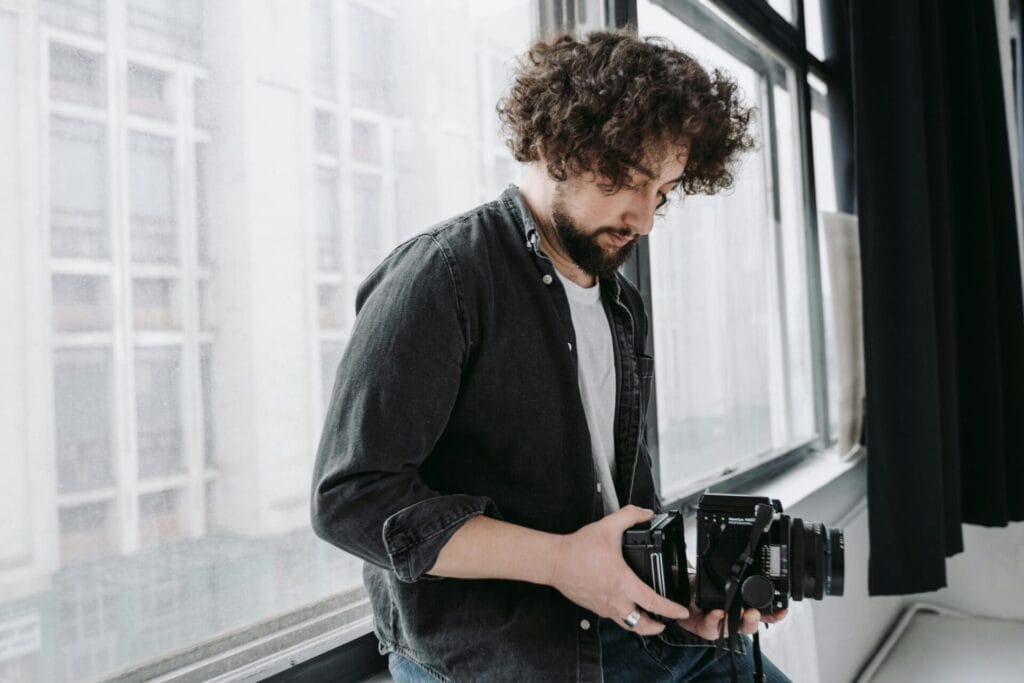 business activities, a man holding a camera